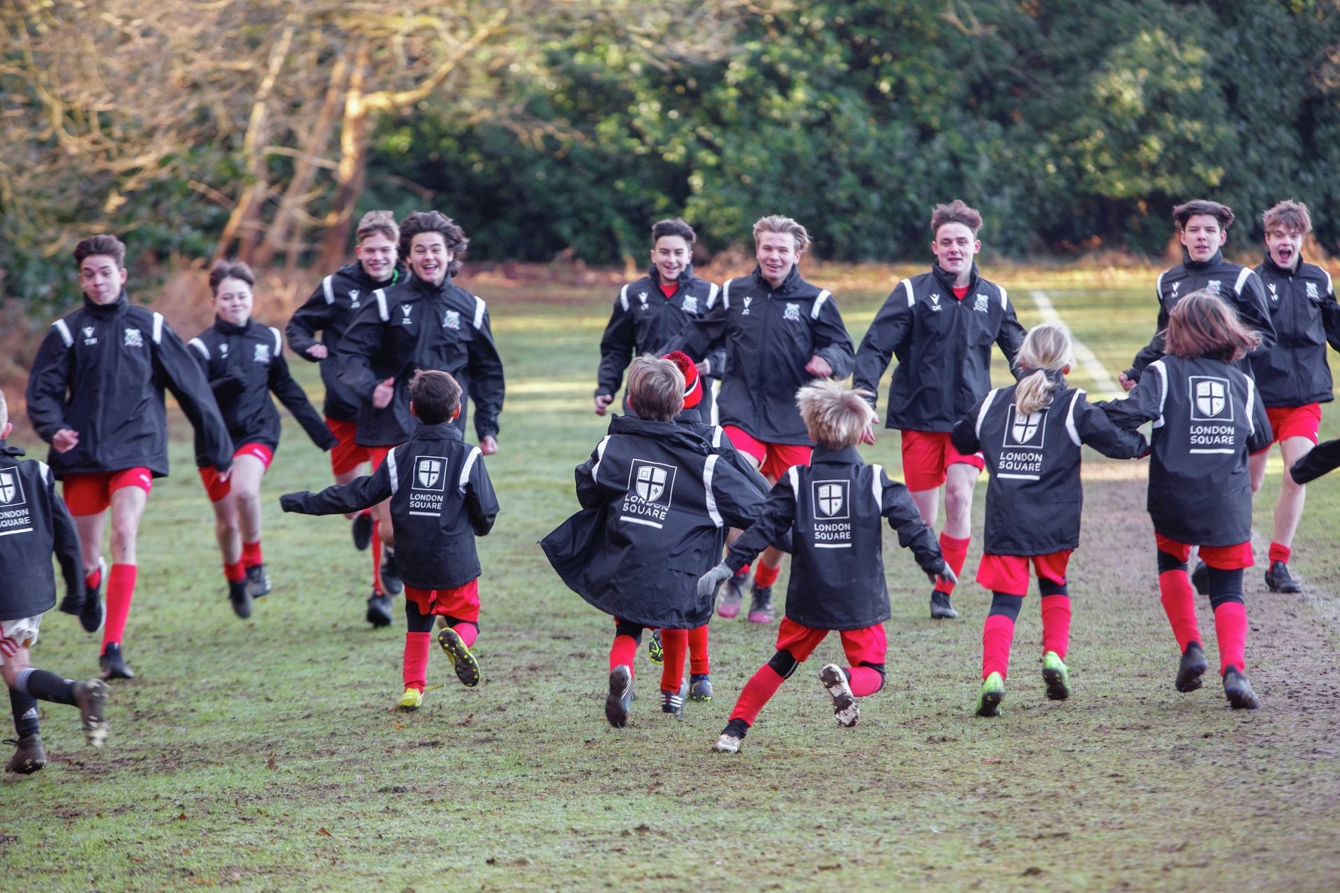 Walton and Hersham Youth Football Club show off their new club jackets 2